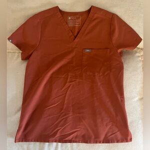 FIGS orange scrub top